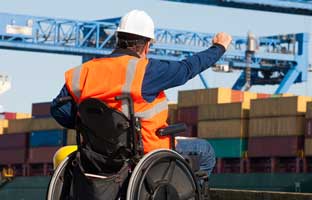 construction worker on wheel chair at construction site